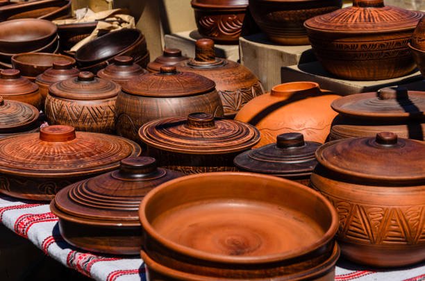 Different wooden pots for sale on a peasant fair